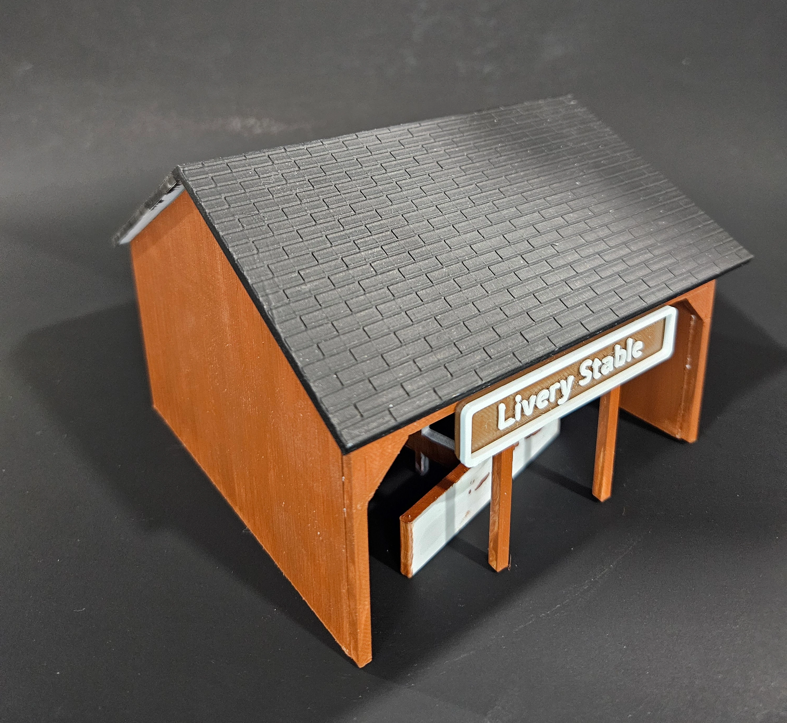 Detailed view of HO scale livery stable siding and facade